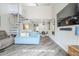 Spacious living room featuring a spiral staircase and open floor plan at 7675 E Mcdonald Dr # 222, Scottsdale, AZ 85250
