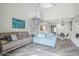 Open concept living area with a spiral staircase and clear view to the kitchen at 7675 E Mcdonald Dr # 222, Scottsdale, AZ 85250