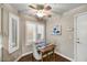 Bright breakfast nook area with wood floors, white plantation shutters, and modern furnishings at 8505 W Oraibi Dr, Peoria, AZ 85382