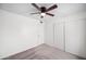 Bedroom featuring carpet, and a ceiling fan at 8920 N 56Th Ave, Glendale, AZ 85302