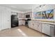 This kitchen is a symphony of style, with its granite countertops and stainless steel appliances at 8920 N 56Th Ave, Glendale, AZ 85302