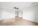 Spacious living room with tile flooring, ceiling fan, and ample natural light at 8920 N 56Th Ave, Glendale, AZ 85302