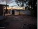 Spacious backyard with potential for landscaping, featuring a shed for extra storage at 9716 E Birchwood Ave, Mesa, AZ 85208