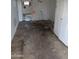 A bedroom with walls that are damaged at 9716 E Birchwood Ave, Mesa, AZ 85208