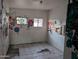 A bedroom with colorful graffiti on the walls at 9716 E Birchwood Ave, Mesa, AZ 85208