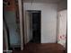 Hallway leading into a bathroom. HVAC unit is also visible at 9716 E Birchwood Ave, Mesa, AZ 85208