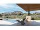 Stunning backyard view of the pool, patio, and mountain scenery perfect for entertaining at 9790 N 56Th St, Paradise Valley, AZ 85253