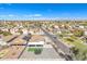 Drone view of the house in a Gathering-friendly neighborhood with low-maintenance backyard at 1145 E Silktassel Trl, San Tan Valley, AZ 85143