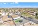 Expansive aerial view of a neighborhood featuring well-maintained homes and desert landscaping at 1145 E Silktassel Trl, San Tan Valley, AZ 85143