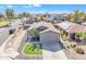 Home aerial view featuring a well-manicured yard and a charming neighborhood setting at 1145 E Silktassel Trl, San Tan Valley, AZ 85143