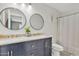 Bright bathroom featuring a double sink vanity with modern fixtures and decor, plus a toilet and shower at 1145 E Silktassel Trl, San Tan Valley, AZ 85143