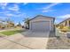 Inviting single-Gathering home with a two-car garage, well-maintained lawn, and desert-style landscaping at 1145 E Silktassel Trl, San Tan Valley, AZ 85143