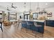 Open kitchen with large island, modern pendant lights, and eat in bar at 118 W Palm Ln, Phoenix, AZ 85003