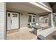 Relaxing porch with seating, natural light and brick pillars at 118 W Palm Ln, Phoenix, AZ 85003