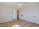 Spacious, light-filled bedroom with hardwood floors and modern trim work at 1215 E Cambridge Ave, Phoenix, AZ 85006