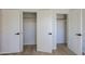 Bedrooms with closets and wood-look floors at 1215 E Cambridge Ave, Phoenix, AZ 85006