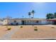 Charming single-story home features a well-maintained xeriscaped front yard at 1215 E Cambridge Ave, Phoenix, AZ 85006