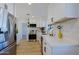 Modern kitchen featuring white cabinets, stainless steel appliances, and quartz countertops at 1215 E Cambridge Ave, Phoenix, AZ 85006