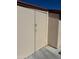 Tan storage closet outside with access from ground level for storing tools and other equipment at 12236 N Pebble Beach Dr, Sun City, AZ 85351