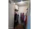 A walk-in closet with plenty of hanging storage and shelving for organized living at 12236 N Pebble Beach Dr, Sun City, AZ 85351