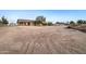 Spacious dirt backyard of home, ready for landscaping at 12326 N Lang Rd, Florence, AZ 85132