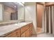 Bathroom featuring a vanity with sink, and a walk-in shower at 12326 N Lang Rd, Florence, AZ 85132