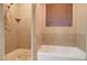 Elegant bathroom with a tiled shower and tub, complemented by a window with blinds at 12326 N Lang Rd, Florence, AZ 85132