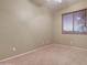 Bedroom with neutral carpet, a window with blinds, and ceiling fan at 12326 N Lang Rd, Florence, AZ 85132