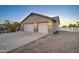 Exterior of large garage with two doors and stucco siding at 12326 N Lang Rd, Florence, AZ 85132