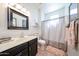 Updated bathroom featuring modern vanity and shower-tub combination at 15712 W Eucalyptus Ct, Surprise, AZ 85374