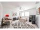 Cozy bedroom with ceiling fan, natural lighting, and comfortable furnishings at 15712 W Eucalyptus Ct, Surprise, AZ 85374