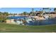 Scenic community lake with cascading waterfalls and lush greenery at 15712 W Eucalyptus Ct, Surprise, AZ 85374