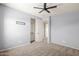 Spacious bedroom with closet and carpet flooring at 16074 W Cortez St, Surprise, AZ 85379