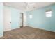 Bright bedroom with a closet and neutral carpet at 16074 W Cortez St, Surprise, AZ 85379