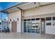 Exterior view of home with double door front entry and tandem carport at 17200 W Bell Rd # 845, Surprise, AZ 85374