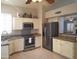 Well-equipped kitchen with stainless steel appliances, granite counters and white cabinetry at 1734 E Commonwealth Cir, Chandler, AZ 85225