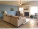 Cozy living room featuring a fireplace, neutral tones, and lots of natural light at 1734 E Commonwealth Cir, Chandler, AZ 85225