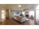 Inviting living room featuring a fireplace, high ceilings, and a comfortable sectional sofa at 1734 E Commonwealth Cir, Chandler, AZ 85225
