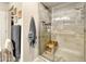 Beautiful bathroom featuring a glass shower with a wooden seat and modern fixtures at 17850 N 68Th St # 2160, Phoenix, AZ 85054