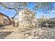 Storage shed in backyard offers a secure space for gardening tools and equipment, enhancing organization at 19061 N 5Th Ave, Phoenix, AZ 85027