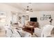 Inviting living area with tile floors, comfortable seating, and rustic decor accents, creating a warm atmosphere at 20438 W Carver Rd, Buckeye, AZ 85326