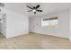 Bedroom featuring a ceiling fan, and a large window for lots of natural light at 2053 W Pecan Rd, Phoenix, AZ 85041