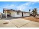 Exterior view of house with driveway and gravel landscaping at 2053 W Pecan Rd, Phoenix, AZ 85041