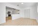 Bright, open-concept living space connected to modern kitchen at 2053 W Pecan Rd, Phoenix, AZ 85041