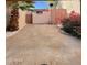 Spacious backyard with potential for customization, featuring a large concrete area and privacy fencing at 2140 E Rosarita Dr, Tempe, AZ 85281