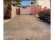 Private patio with concrete flooring, mature palm tree, lush floral bushes, and string lights at 2140 E Rosarita Dr, Tempe, AZ 85281