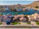 Stunning waterfront home with a private dock and mountain views creates an inviting lakeside living experience at 21666 N 53Rd Dr, Glendale, AZ 85308