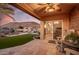 An outdoor patio area, complete with a covered seating area, overlooking the water at 21666 N 53Rd Dr, Glendale, AZ 85308