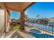 Balcony view of waterway with a private pool, lush landscaping, and beautiful waterfront homes in the distance at 21666 N 53Rd Dr, Glendale, AZ 85308