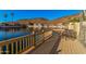 Waterfront deck with seating overlooking a serene lake and mountain views, perfect for relaxing at 21666 N 53Rd Dr, Glendale, AZ 85308